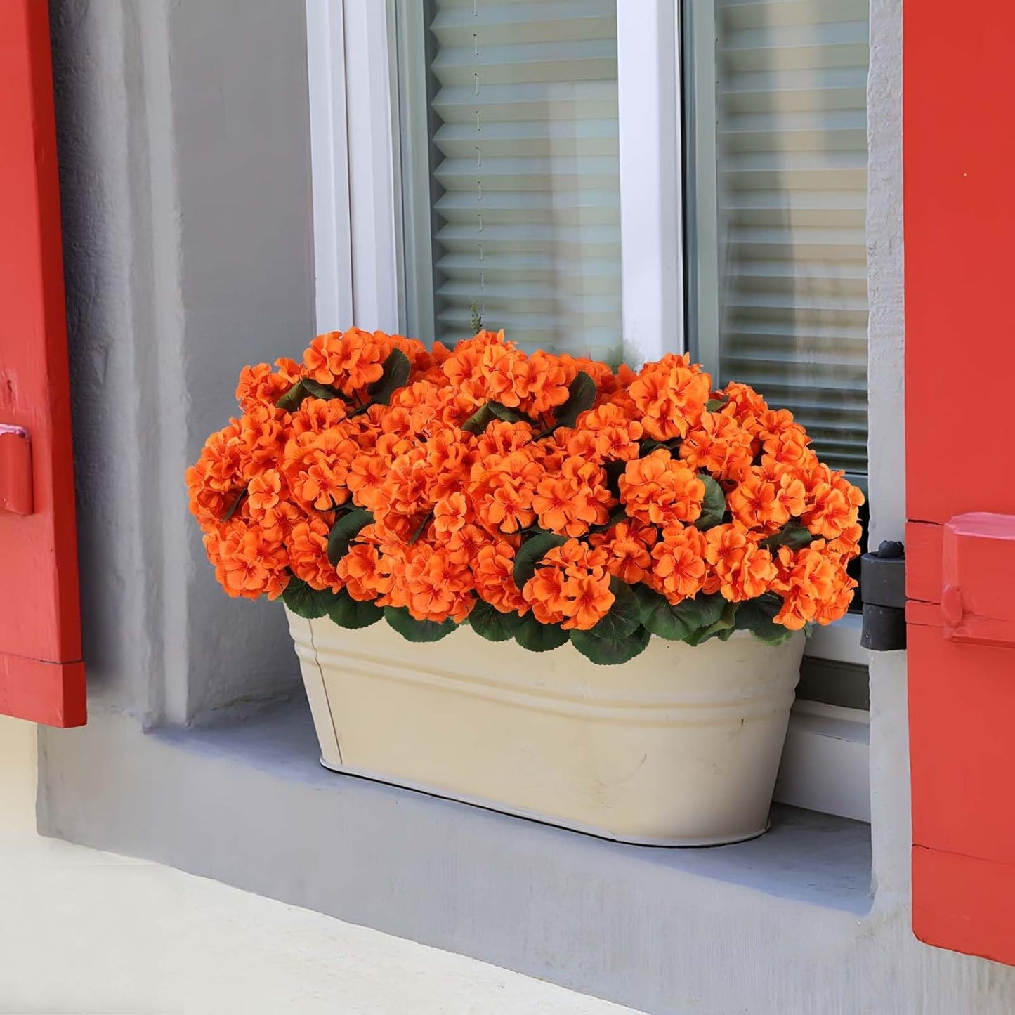 Hananona 12 Pcs Artificial Geranium Flowers for Outdoors Geranium Silk Orange Flower Outdoor UV Resistant Patio Plants Faux Autumn Flowers for Fall Home Kitchen Table Centerpieces (12, Orange)